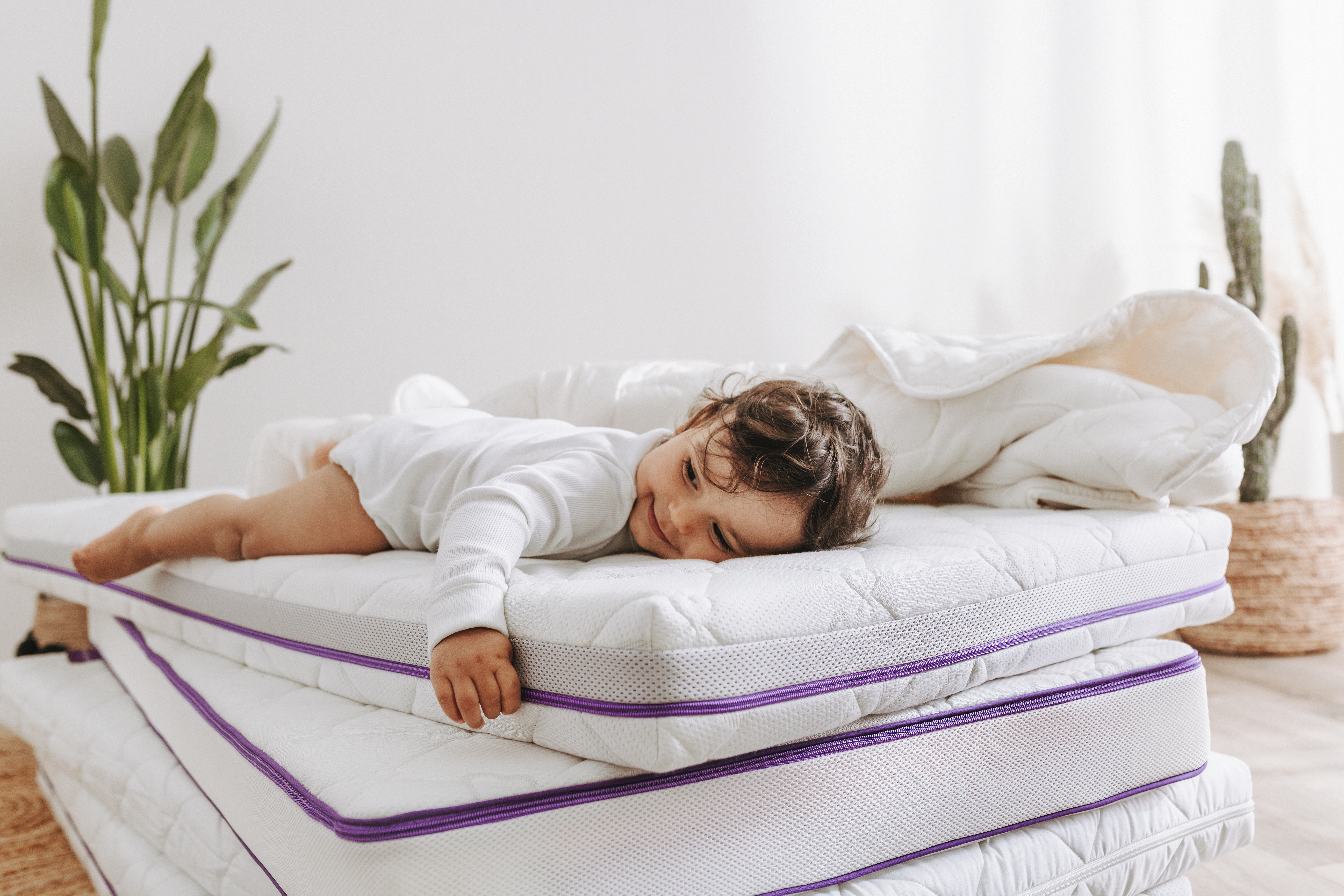 Wie vermeidet man Wärmestau im Babybett?