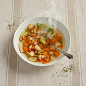 Mothers Finest Bio-Wochenbettessen für Mamas Dampfender Teller mit frisch gekochten Wochenbett-Fertiggericht